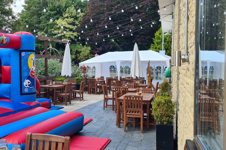 Outdoor area with bouncing castle