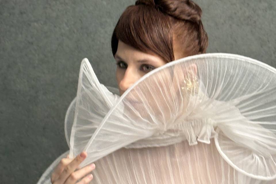 A sleek hairstyle with bun