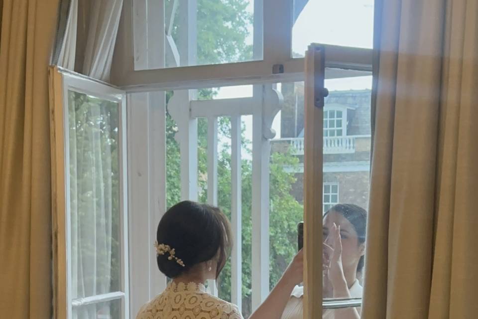 A sleek hairstyle with low bun