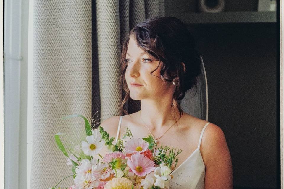 H in her dress, waiting to go
