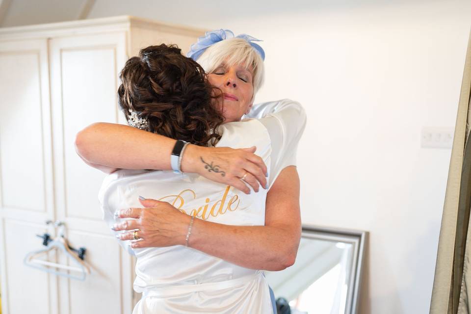 Mother of the bride hug