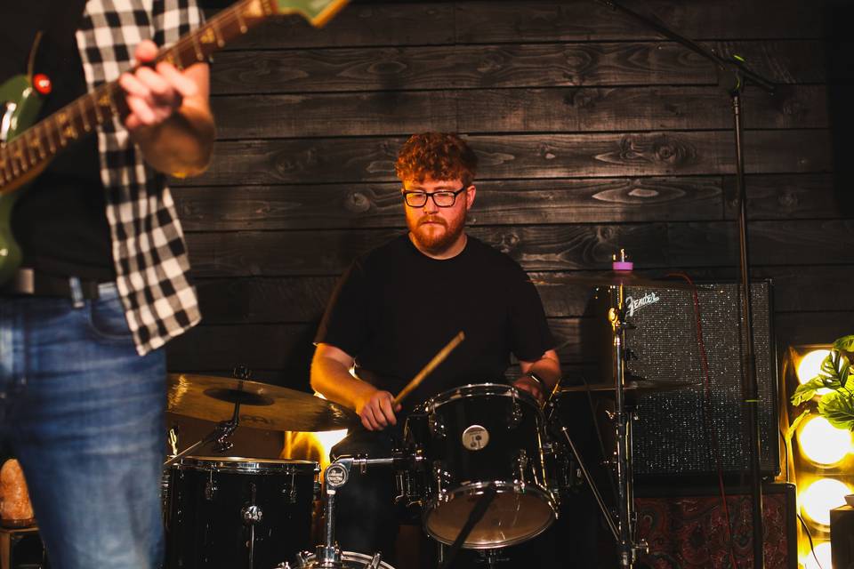 Calum on drums