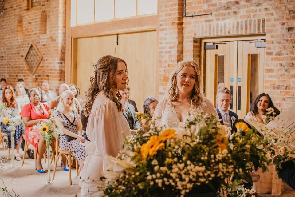 Brides At Top Of Aisle