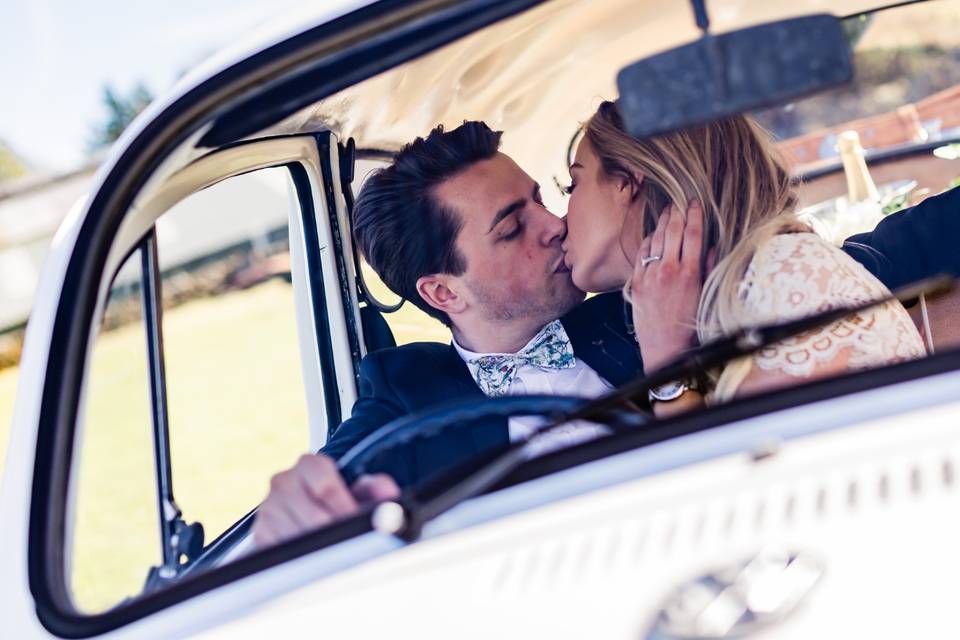 Couple kiss in car