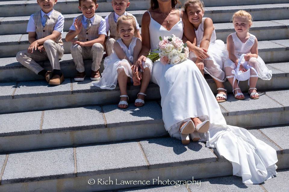 Bride and children on the step