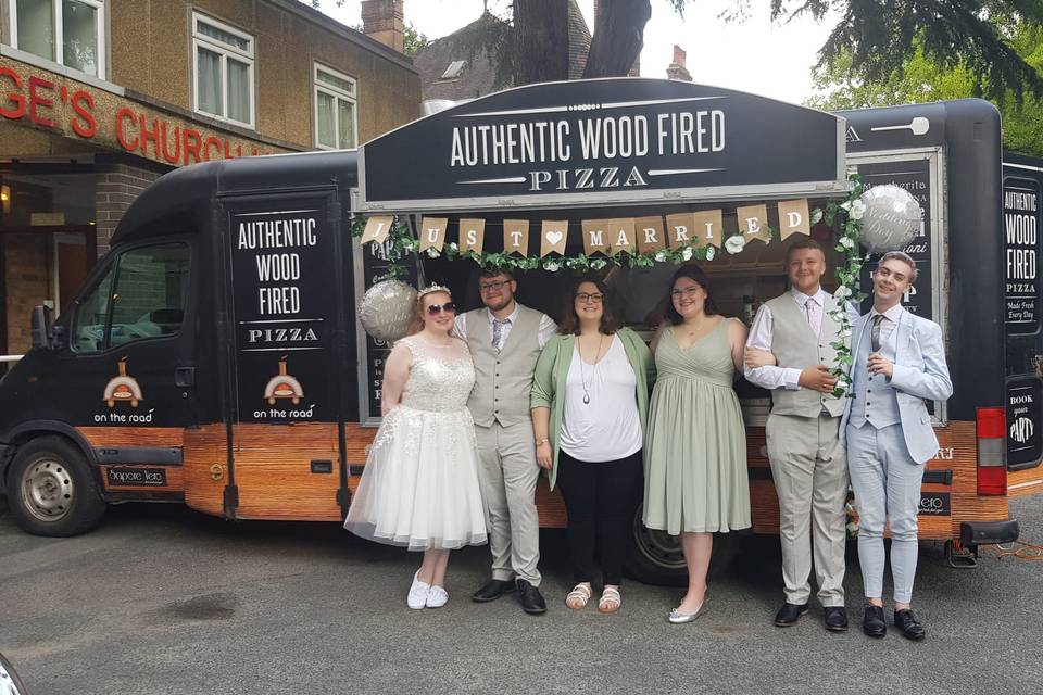 Bridal party with the truck.