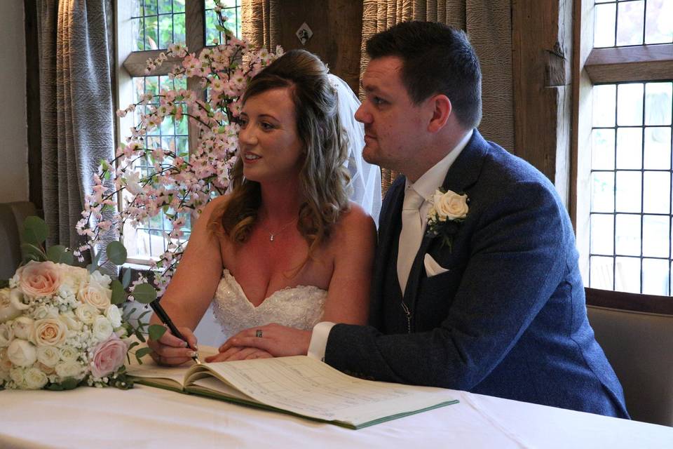 Couple Signing the documents