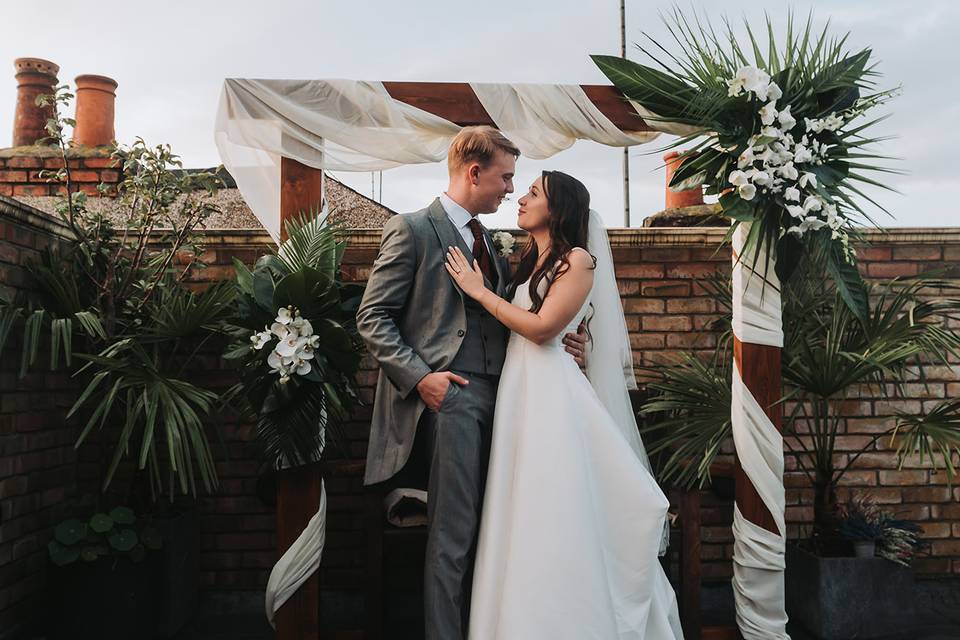 Couple by an arch