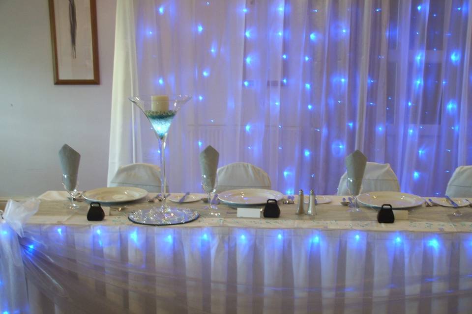 Twinkly curtain with vases