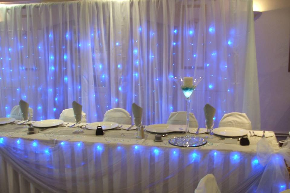 Twinkly curtain with vases