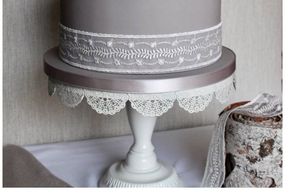 Simple grey lace wedding cake