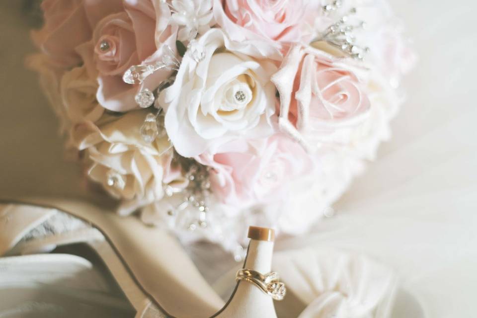 Shoes, bouquet and ring