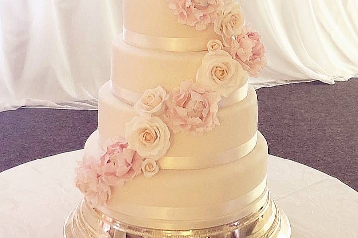 Blooms on a white cake