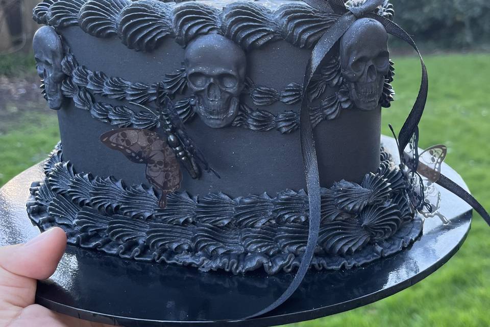 Black Lambeth style cake