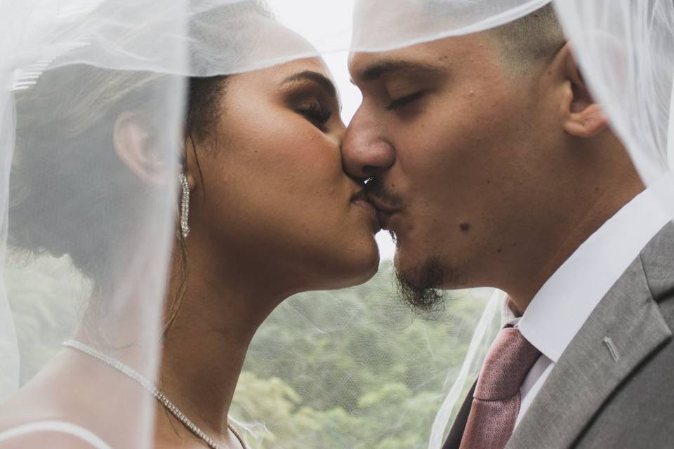 Bride and groom kissing