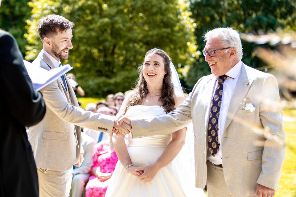 Bride being given away