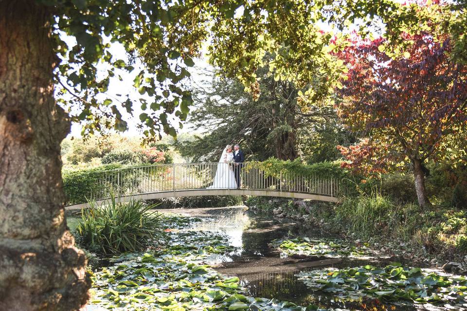 The bride & groom on bridge