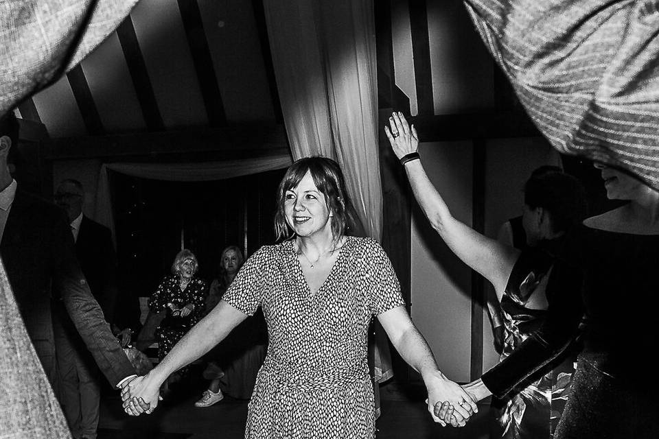 Happy guests dancing.