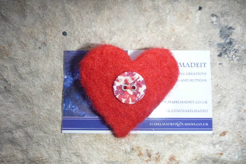 Small needlefelted red heart, floral button