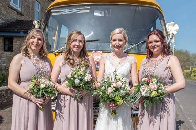 The smiling bridal party