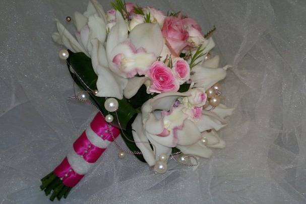 Hand tied of roses and orchids