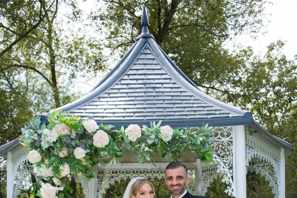 Standing under the gazebo