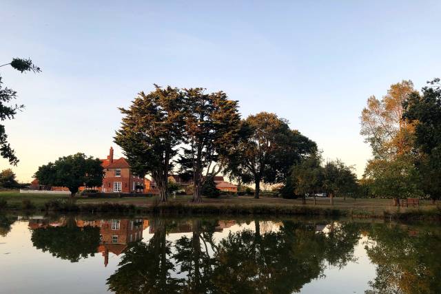 View from lake towards the main Barn