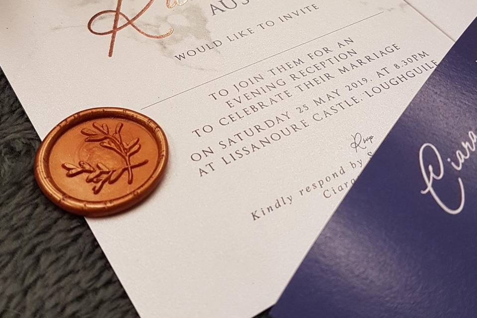 Traditional invitation with wax seal details