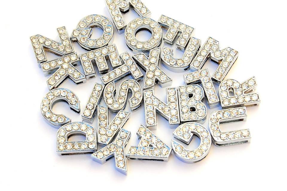 Crystal letter brooches