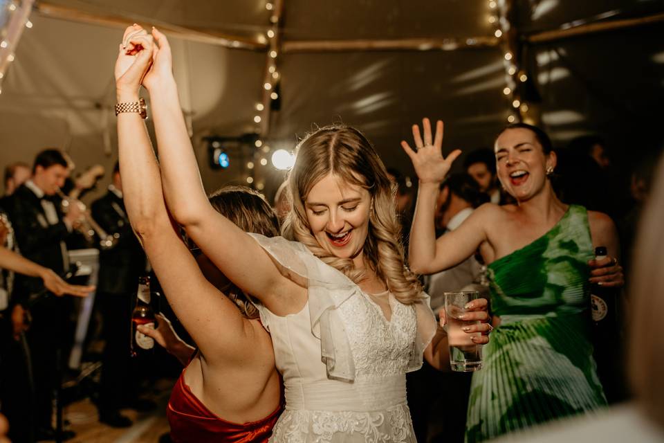 Bride dancing in tipi
