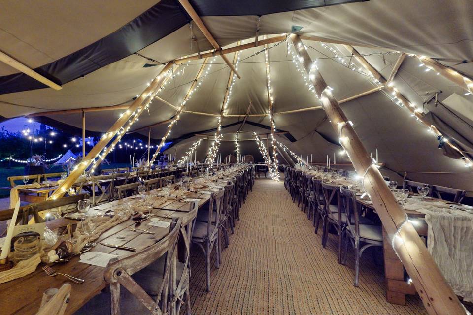 Inside tipis at night