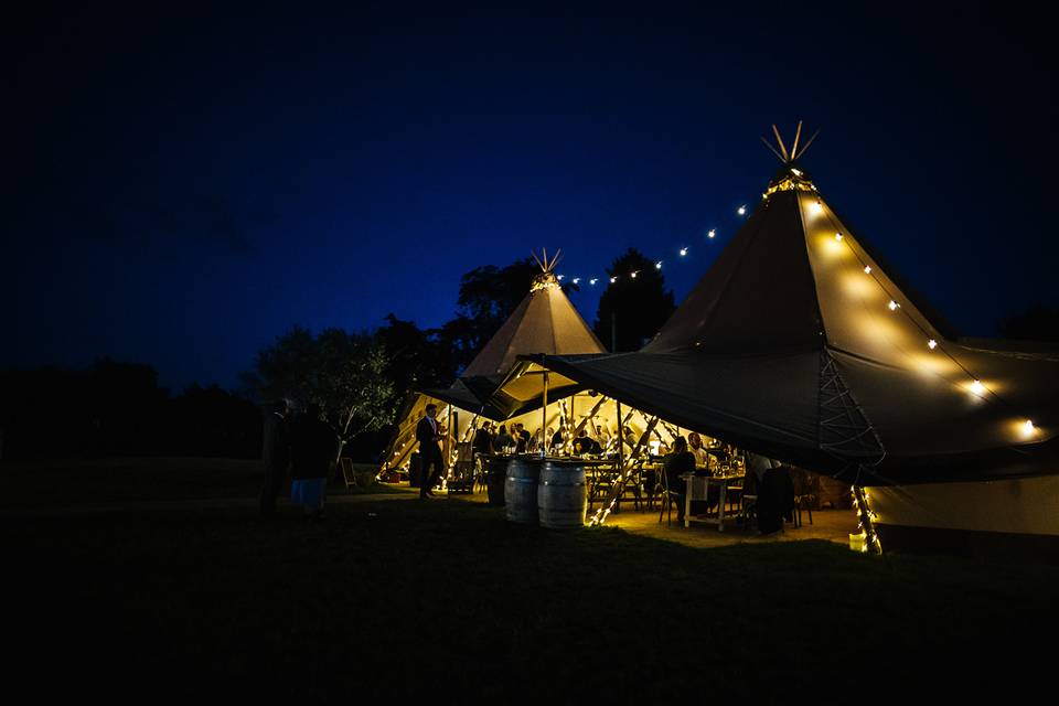 Tipis at night