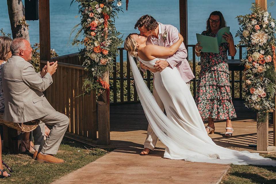 Romantic kiss at ceremony