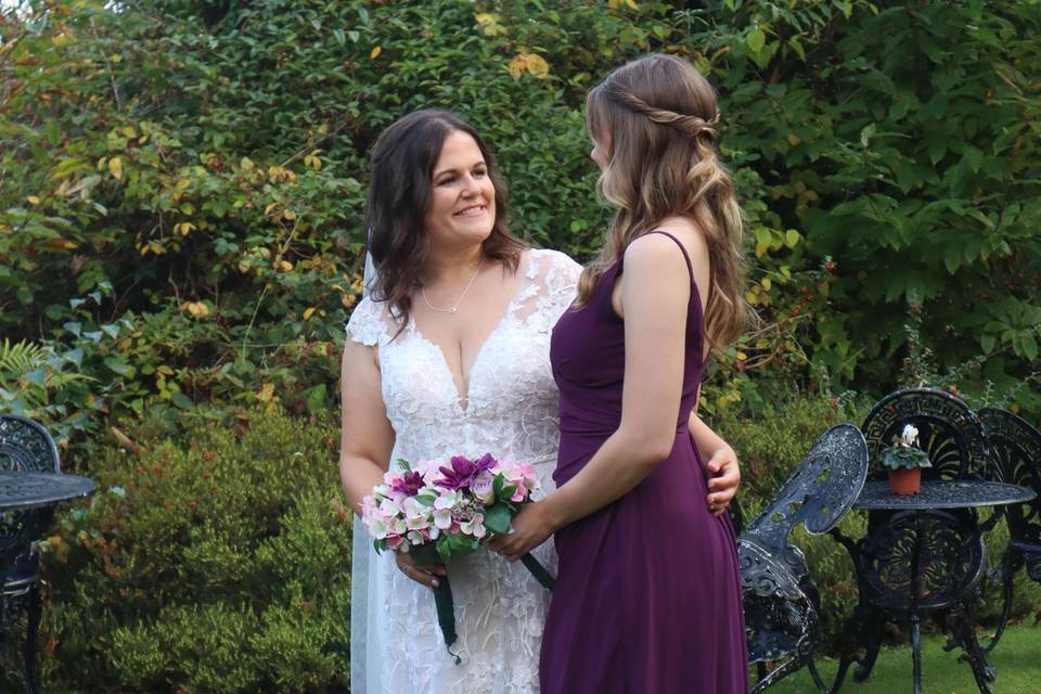 Bridesmaid and Bride photo